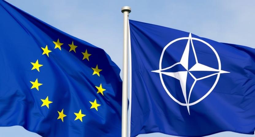 A composition of the EU and NATO flags flying side by side, symbolizing the strategic Western alignment.